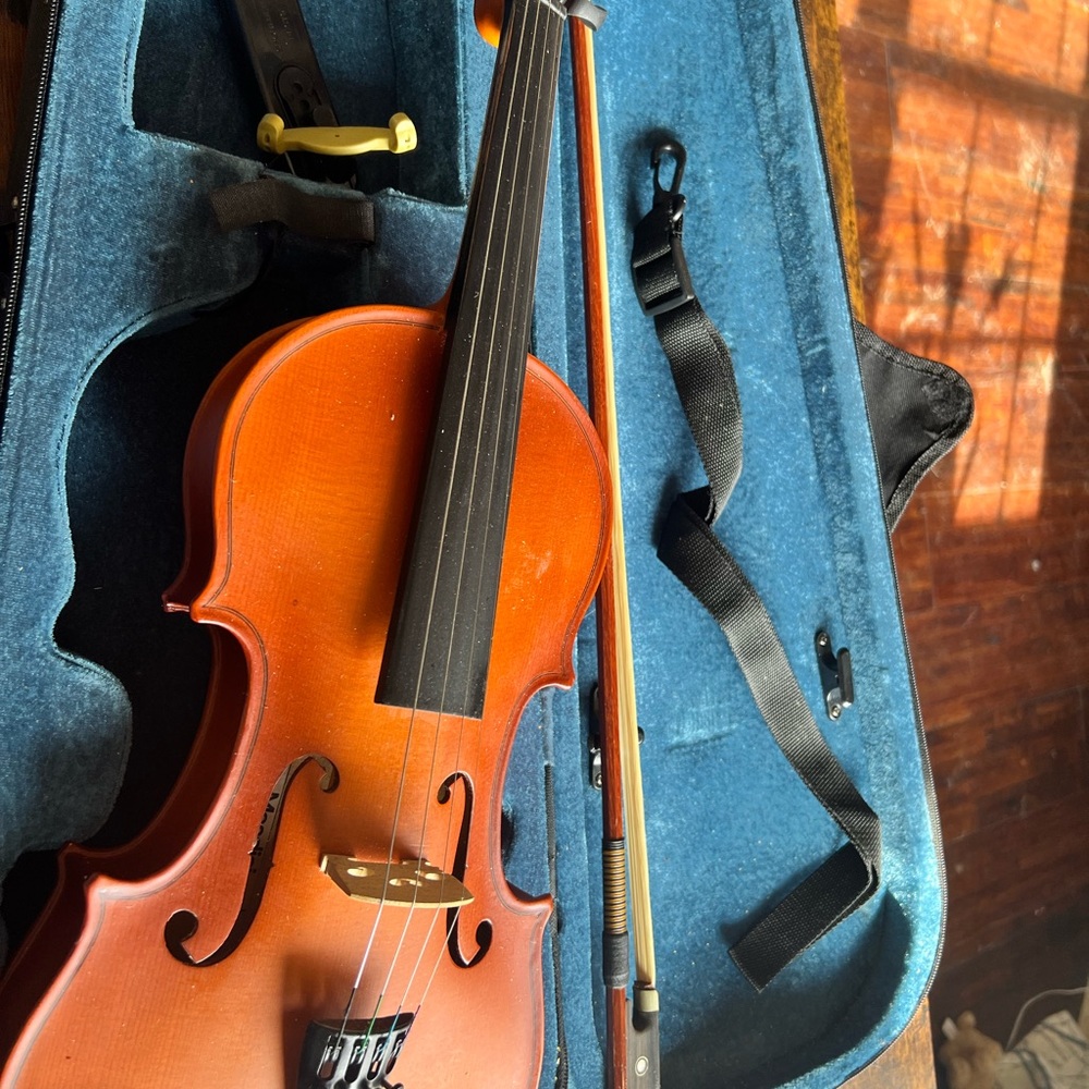 Elegant Orange Violin with Bow